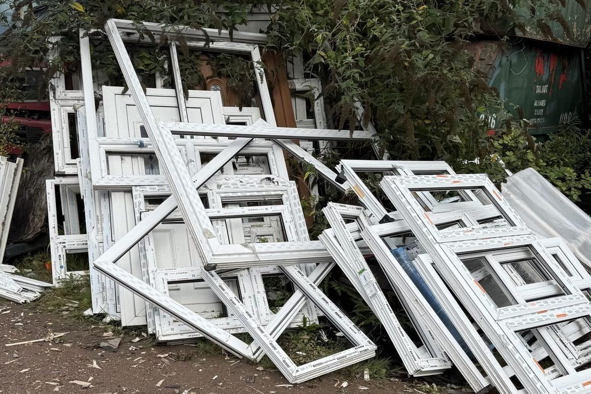 Scrap uPVC window frames stacked at one of our yards